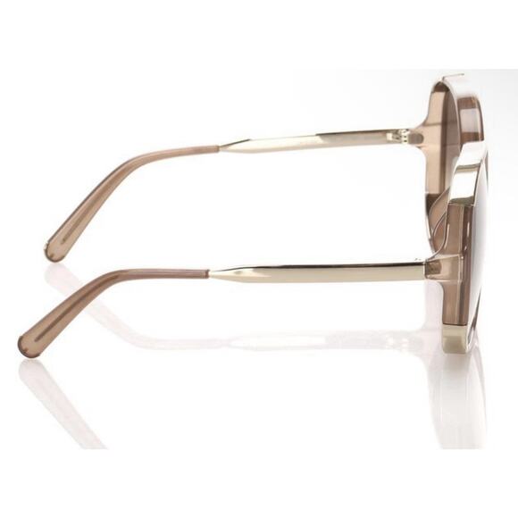 Chloé CE712S sunglasses feature a distinct brown and gold oversized round frame main image 10